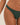Close-up of a woman's hip wearing a dark forest green textured crinkle high-cut bikini bottom, highlighting the fabric's unique texture and the garment's cut.
