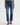 A woman wearing mid-rise medium blue wash straight leg denim with a distressed hem, fading, and gold stitching on a white background.