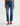 A woman wearing mid-rise medium blue wash straight leg denim with a distressed hem, fading, and gold stitching on a white background.
