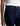 Person wearing dark blue jeans and a white shirt on a light background