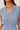 barletta  striped dress with ruffled shoulders on a plain background
