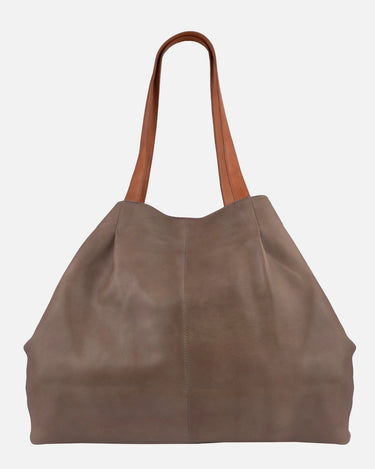 A large taupe-brown leather tote bag with contrasting medium-brown shoulder straps, shown against a plain light gray background.