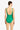 Green swimsuit worn by a model on a white background