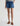 A waist down front image of medium wash denim jean shorts