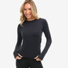 Woman wearing a black long-sleeve top on a white background