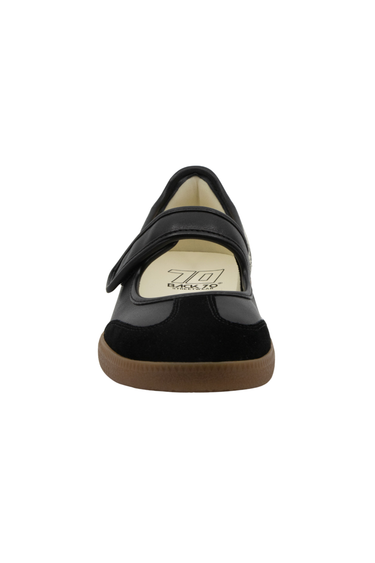 A toe view of Mary Jane back 70 sneaker in black on a white background