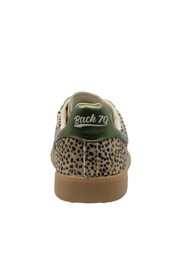 A single low-top sneaker shown from the back, featuring a beige and black leopard print upper, an olive green heel tab with 'Back 70' in white script, and a tan gum sole.