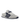 White sneaker with navy accents on a white background