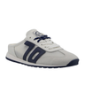 White sneaker with navy accents on a white background
