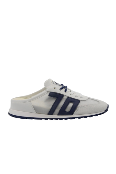 White sneaker with navy accents on a white background
