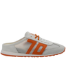White shoe with orange accents on a white background