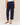 Navy blue pants worn by a person on a plain background