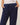 Navy blue pants with a drawstring waist on a beige background