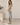 Side view of Bella Dahl Long Maxi Bias Skirt in Painted Spots showing the fluid bias-cut silhouette