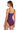 A woman modeling a purple one-piece shapewear bodysuit from the back, showing the thin shoulder straps and back design, against a plain white background.