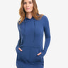 Woman wearing a blue hoodie dress on a white background