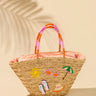 Woven basket with embroidered designs on a beige background