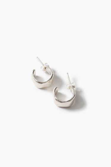 Pair of silver hoop earrings on a white background