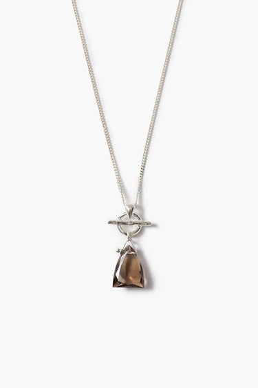 a sterling silver necklace with a smokey quartz pendant on a white background