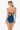 Woman wearing a blue strapless swimsuit with cut-out design on a white background