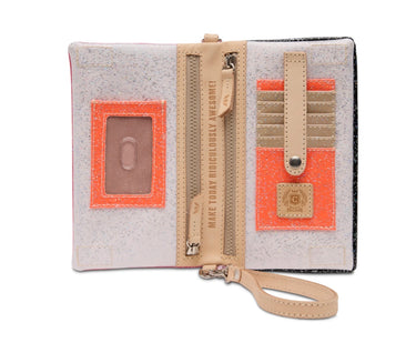 A glittery light pink and white organizer pouch with beige leather-like trim, a wrist strap, a central zipper, card slots, and bright orange accent panels on a white background.