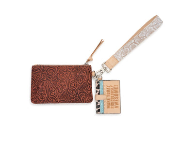 A brown embossed leather wristlet pouch with a matching wrist strap and a small hanging tag that reads 'MAKE TODAY MURDEROUS AWESOME!' on a white background.