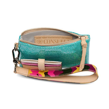 A turquoise glittery wristlet clutch with a beige interior and a colorful camo-patterned strap, shown open on a white background. The interior label reads 'CONSULT'.