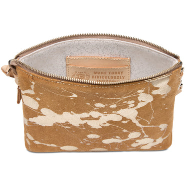 A rectangular zippered pouch with a tan and cream paint splatter pattern, featuring a light tan leather brand patch on the inside that reads 'MAKE TODAY RIDICULOUSLY'.