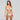 Woman wearing a beige crochet bikini against a gray background