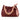 a leather clutch and crossbody purse on a white background
