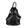 A black leather foldable backpack with silver hardware on a white background