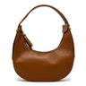 a half moon leather bag in camel on a white backgound.