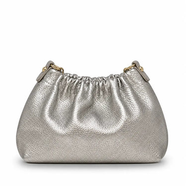 a pewter leather clutch on a white background 