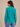 a green striped button down top and jeans