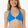Woman wearing a blue bikini top on a white background