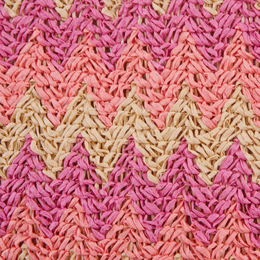 Close-up of pink and beige textured fabric pattern
