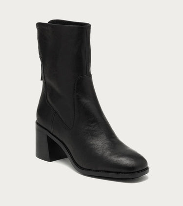 The image shows the side of a black leather heeled ankle boot on a white background