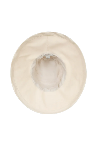 A beige had on a neutral background