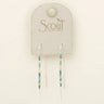A pair of long beaded dangle earrings displayed on a light gray Scout Curated Wear card. The earrings feature turquoise, black, and cream beads with silver-toned metal wire ends.