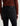 A woman facing backwards wearing slim straight jeans in black with black boots and a maroon long sleeve tee on a white background.