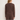 A woman wearing a knit brown sweater and brown knit pants on a white background