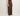A woman wearing brown knit pants on a white  background