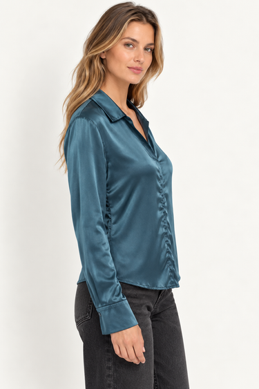 Everly Petrol satin long sleeve collared top, angled view showing wide cuffs and draped silhouette