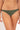 Person wearing a green bikini bottom on a plain background