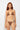 Woman wearing a brown polka dot bikini against a white background
