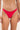 a woman wearing a red bikini bottom on a neutral background