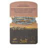 Blue howlite stone wrap necklace on branded cardstock