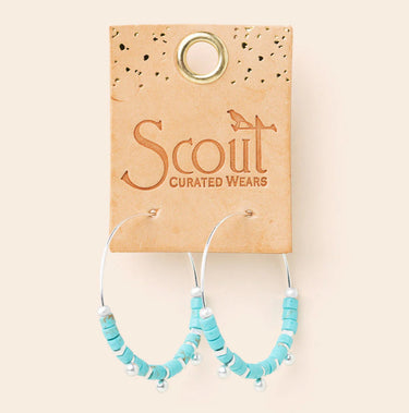silver hoop earrings with turquoise stones and silver accents 
