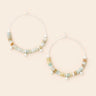 Two beaded necklaces on a beige background