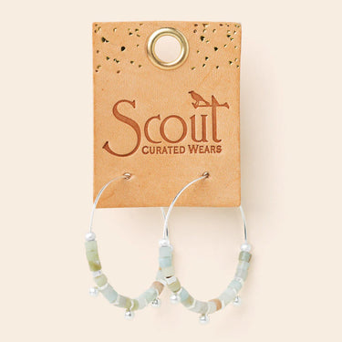 Beaded hoop earrings on a Scout Curated Wears card against a beige background